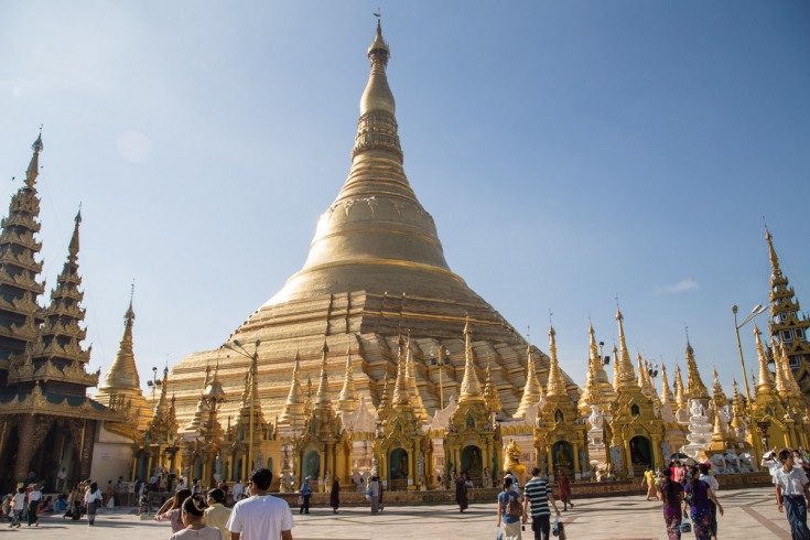 Above them, majestically towers the main stupa – the golden jewel in the crown of the temple complex.